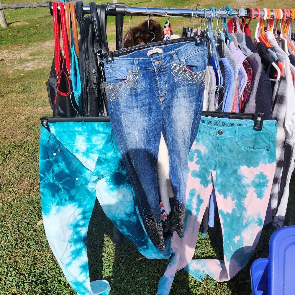 Tyedye jeans on right(looking)at picture and jeans in middle. Size 4 and 27